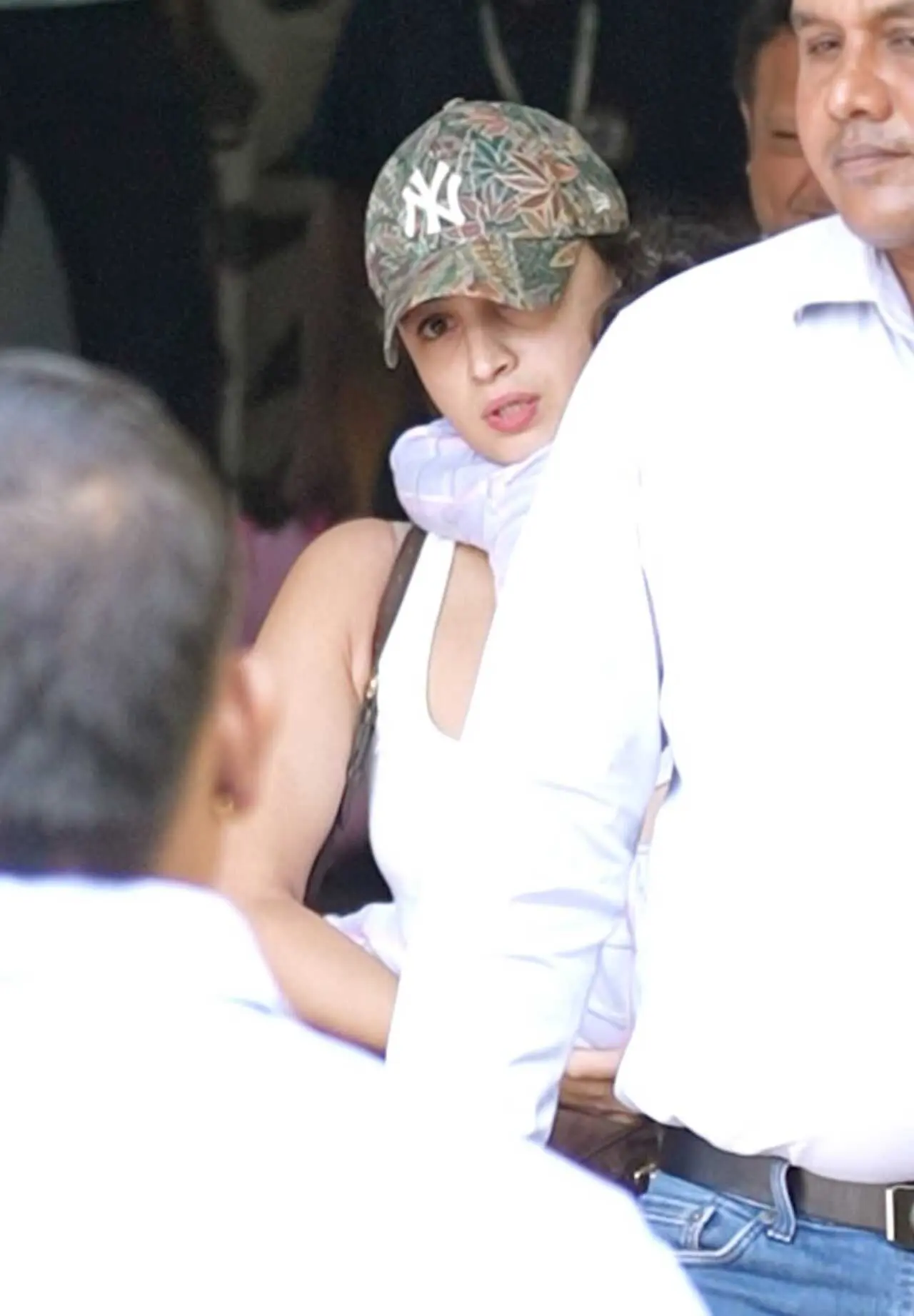 Alia Bhatt was seen returning from Milan Fashion Week with little Raha. She waved at the paps before making her way to the car.